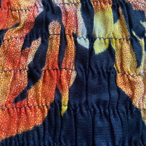 Black Halter Dress with Vibrant Floral Pattern - Picture 3 of 3